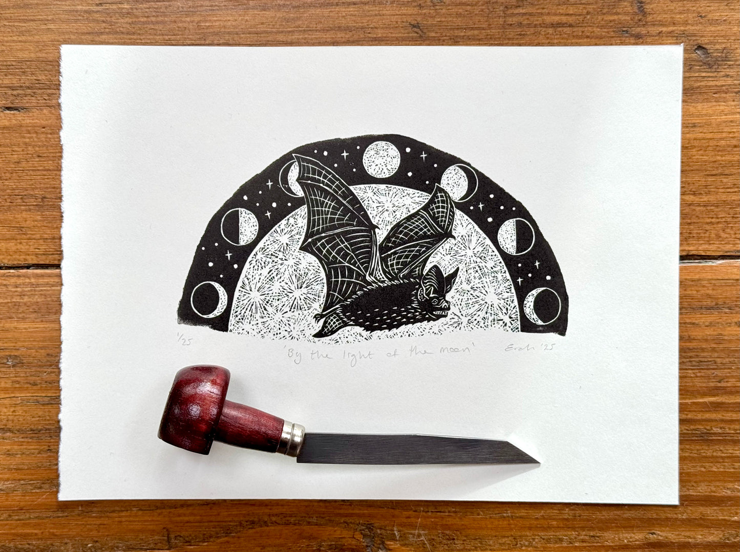 Bat and moon wood engraving