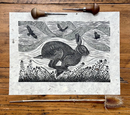Linocut print of hare and crows